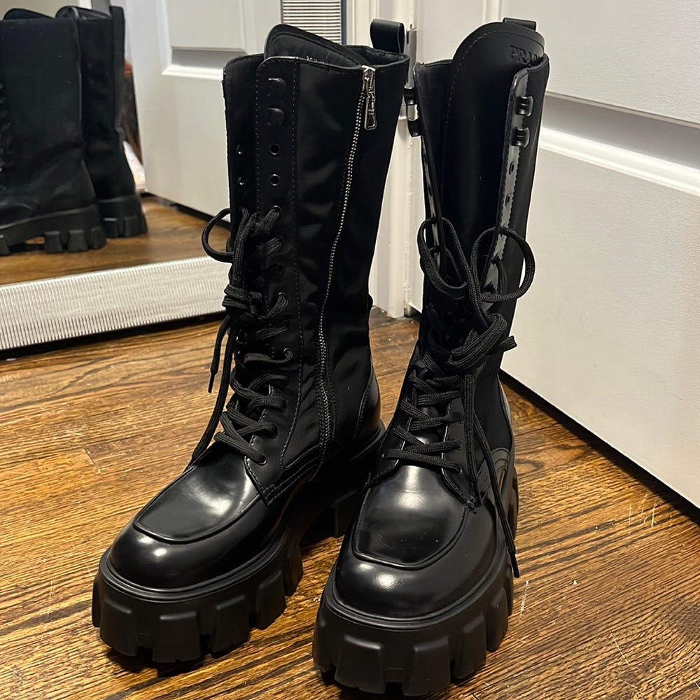 Worn once authentic Prada combat boots size 37 and dust bags.